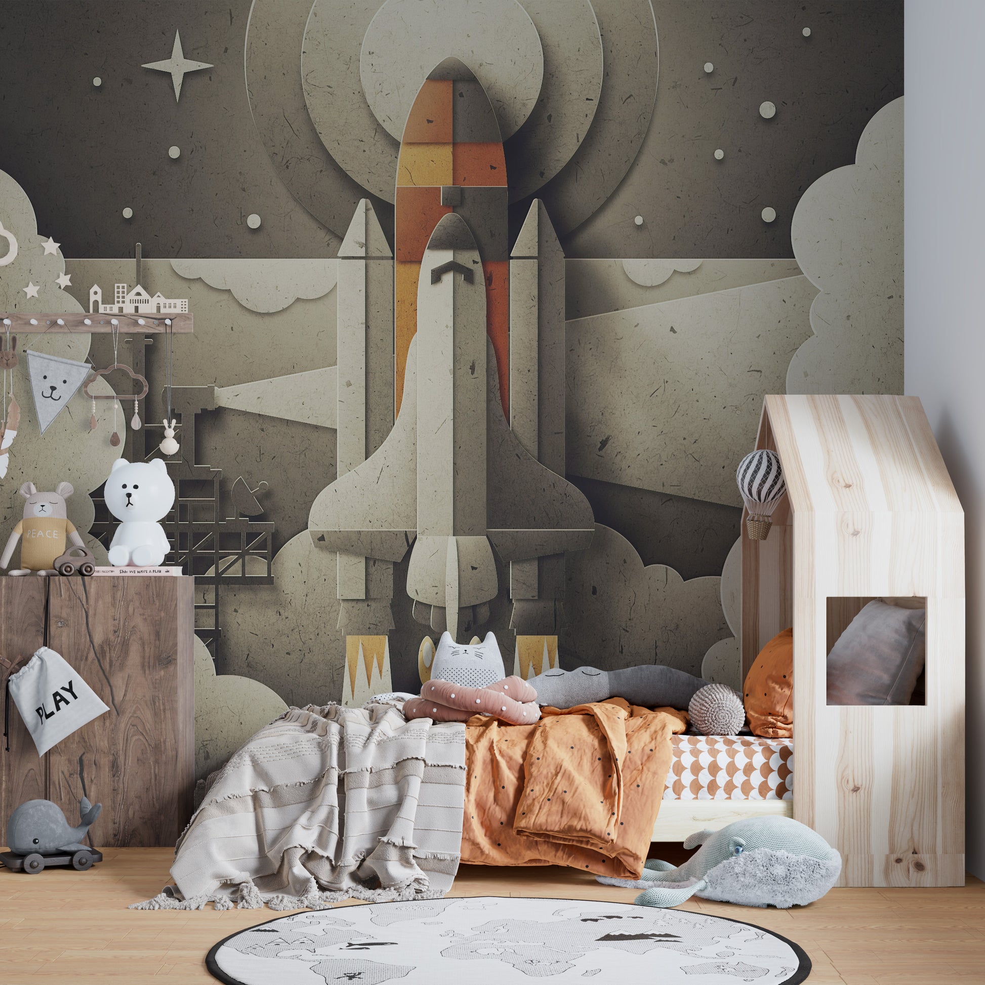 Retro Space Rocket wallpaper mural as a feature wall in a bright, contemporary living room in gray tones