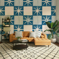 Indigo starburst quilt block wallpaper close-up

