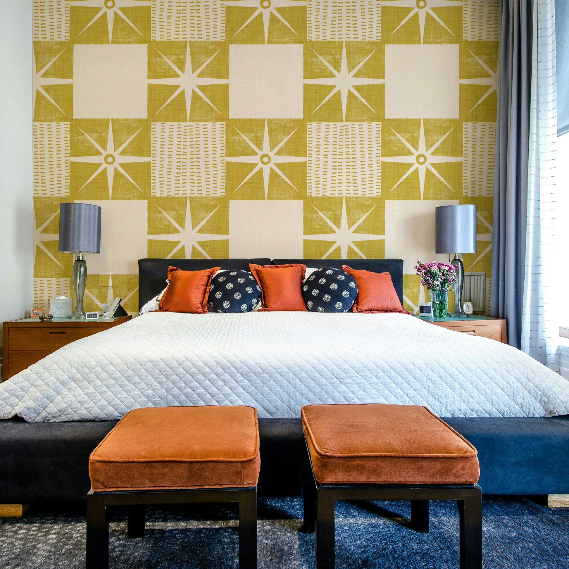 Mustard yellow mid-century starburst wallpaper close-up

