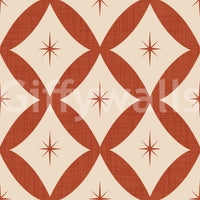 Mid-century geometric wallpaper with tiled diamond forms and starburst centers.
