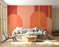 The colors are soft, muted tones of terracotta, beige, and sand.

