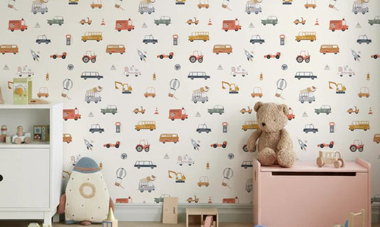 Road Trip Fun Cream background wallpaper mural in a kids room with a white sideboard, pink toy chest and teddy bear
