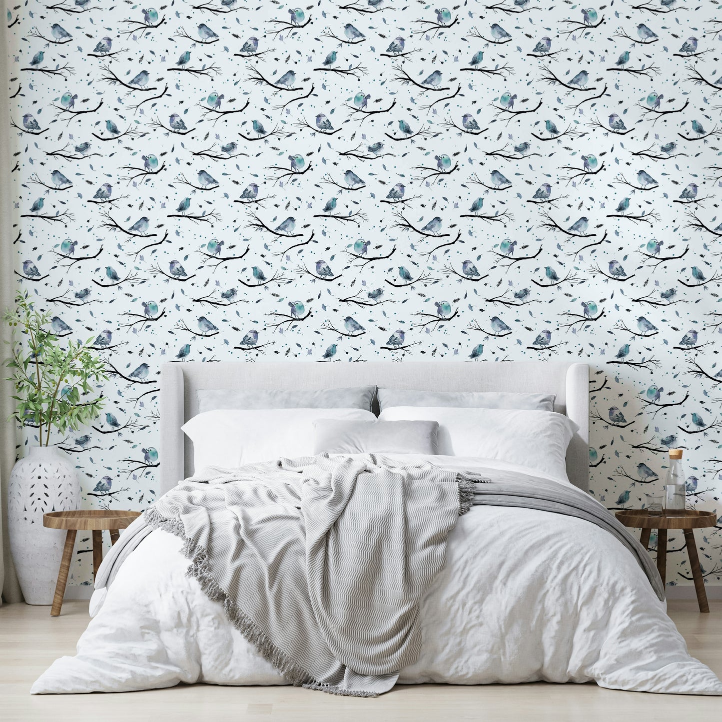 Soft blue wallpaper with woodland bird design

