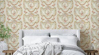 Rococo Romance Wallpaper with blush florals and birds on a cream base.

