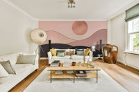 The colors are soft, muted tones of rose gold, pink, and white.

