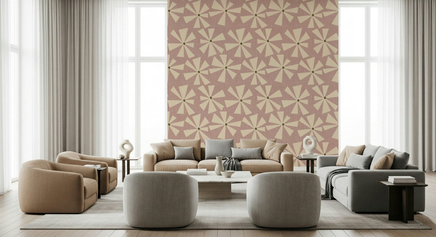 Patterned wallpaper with cream geometric flower bursts on a warm rose-colored backdrop.