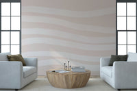 An artistic fluid pattern mural on minimalist wallpaper.