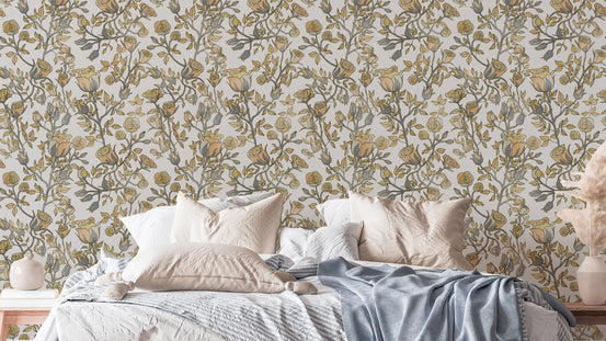 Roses Tree Golden and Gray wallpaper behind a bed with cream and blue bedding in a soft bedroom