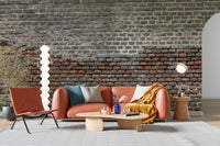 Soiled Dirt & Rustic Brick wallpaper mural as a feature wall in a home office workspace in brown tones