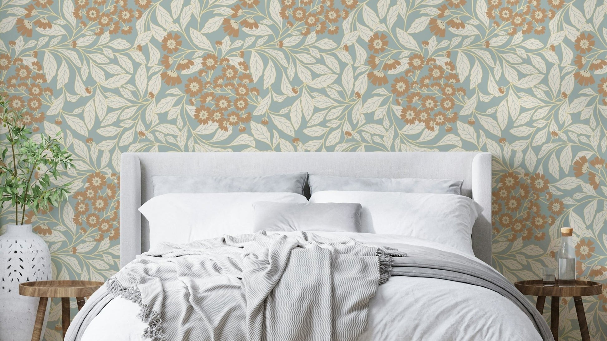 The image shows a repeating pattern of rustic flowers and leaves.

