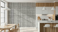 Rustic linear grid wallpaper creating a warm, natural interior style.