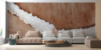 Rustic Horizon Textured wallpaper mural in terracotta and white behind beige and cream sofas in a living room