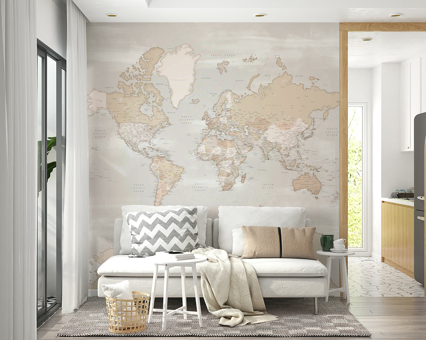 Rustic World Map wallpaper in beige behind a white sofa with grey chevron and tan cushions in a Scandi living room