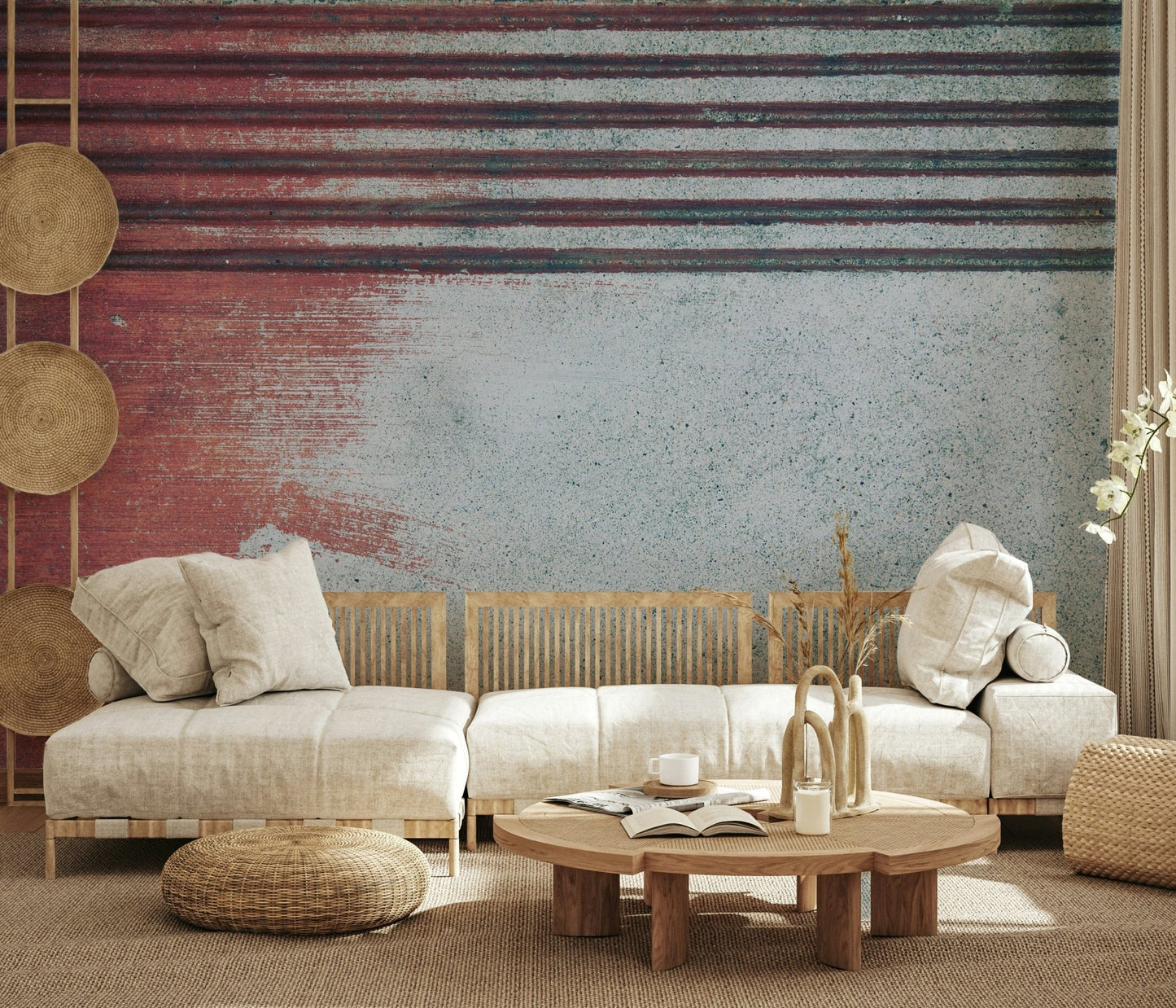 Rustic Rouge Concrete wallpaper mural in red and gray behind a light wood sofa and round coffee table