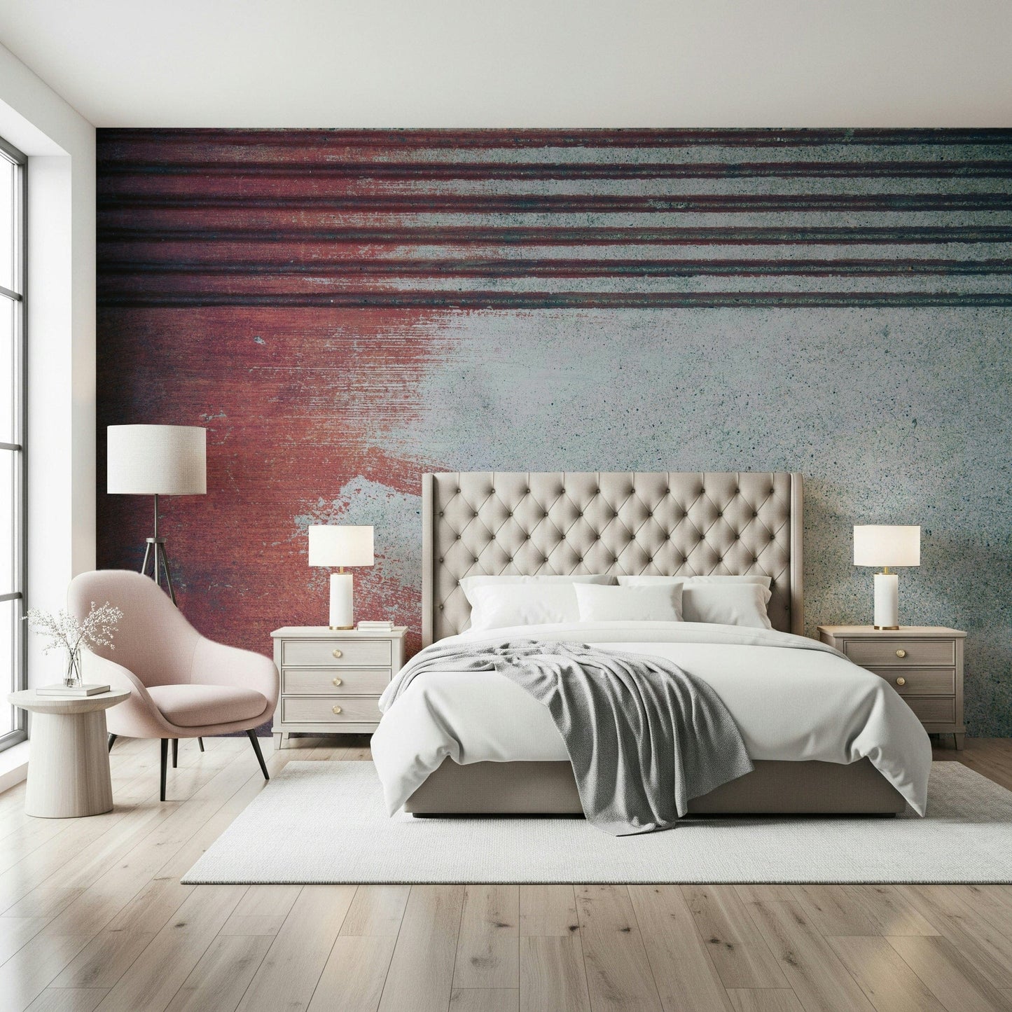 Rustic Rouge Concrete wallpaper mural in red and gray behind a beige tufted bed and pink armchair