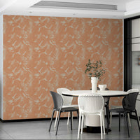 Artistic rust and metal brushstroke wallpaper for bold interiors

