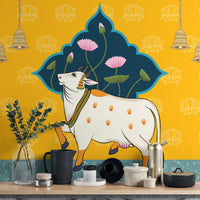 Hindu temple cow painting with sacred handprints
