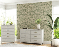 Subtle diffused petals in Painterly Soft Blossom Wallpaper gentle design.