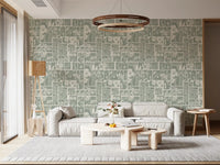 Floral collage wallpaper with natural green base