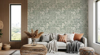 Living room sage wallpaper with botanical collage pattern