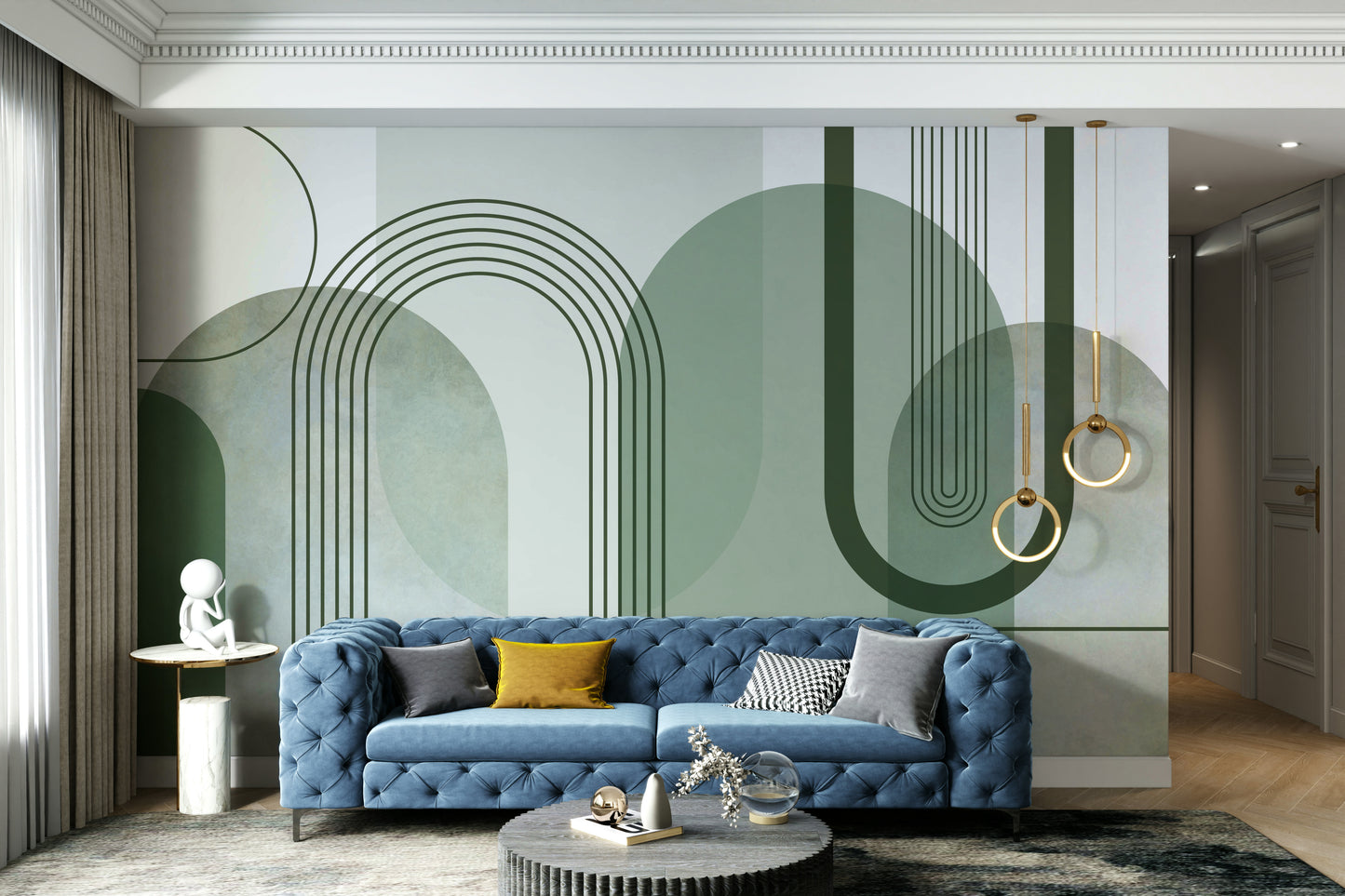 Sage Green Archways wallpaper mural behind a blue tufted sofa with mustard cushions and gold ring pendants in a living room
