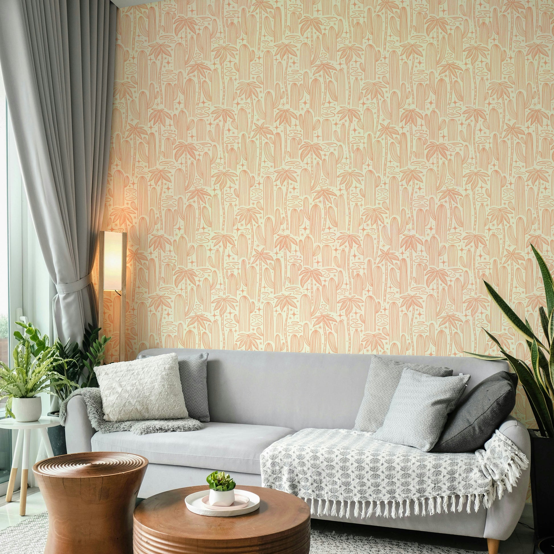 Soft desert mural with cacti and star elements

