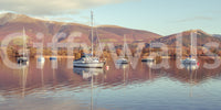 Calm lake scene with boats wallpaper design

