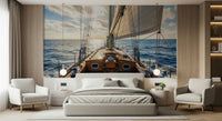 Sailing scene mural behind gray sectional, modern coastal living room backdrop
