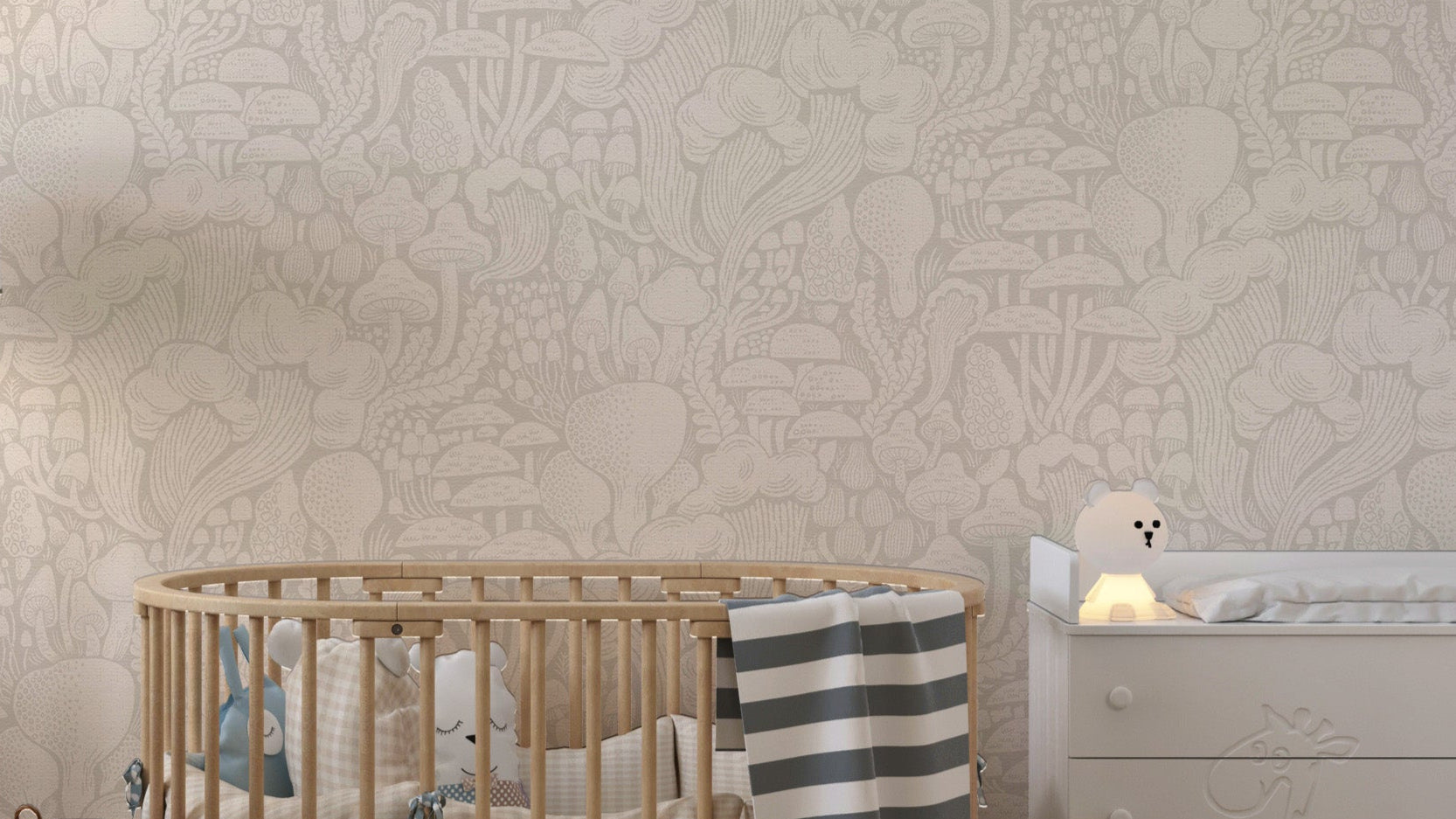 Sand Fungi Forest Silhouettes wallpaper in a soft nursery with oval wooden crib and white dresser