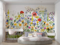 The scene includes colorful poppies and wildflowers.

