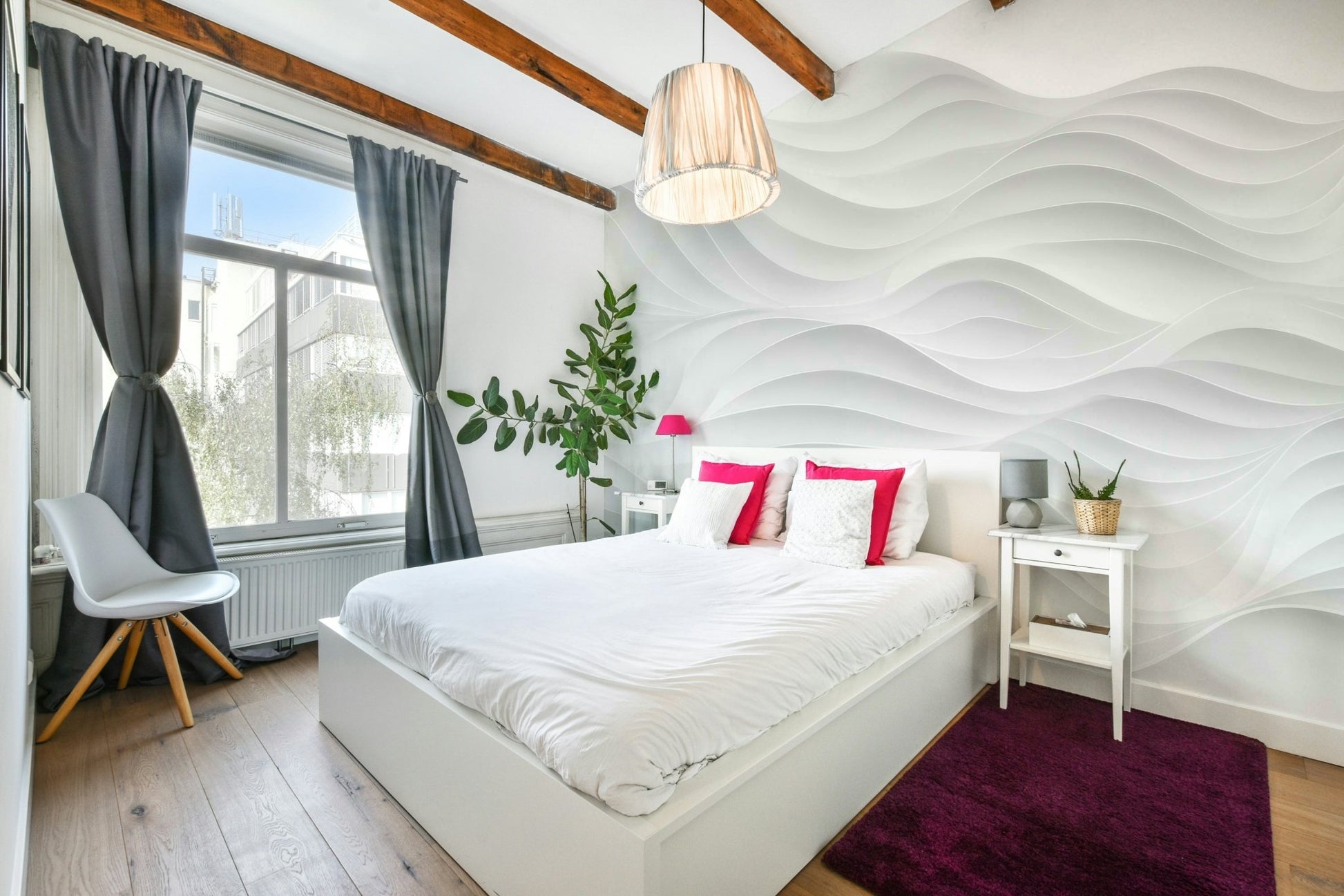 The wall mural is installed on a living room feature wall.

