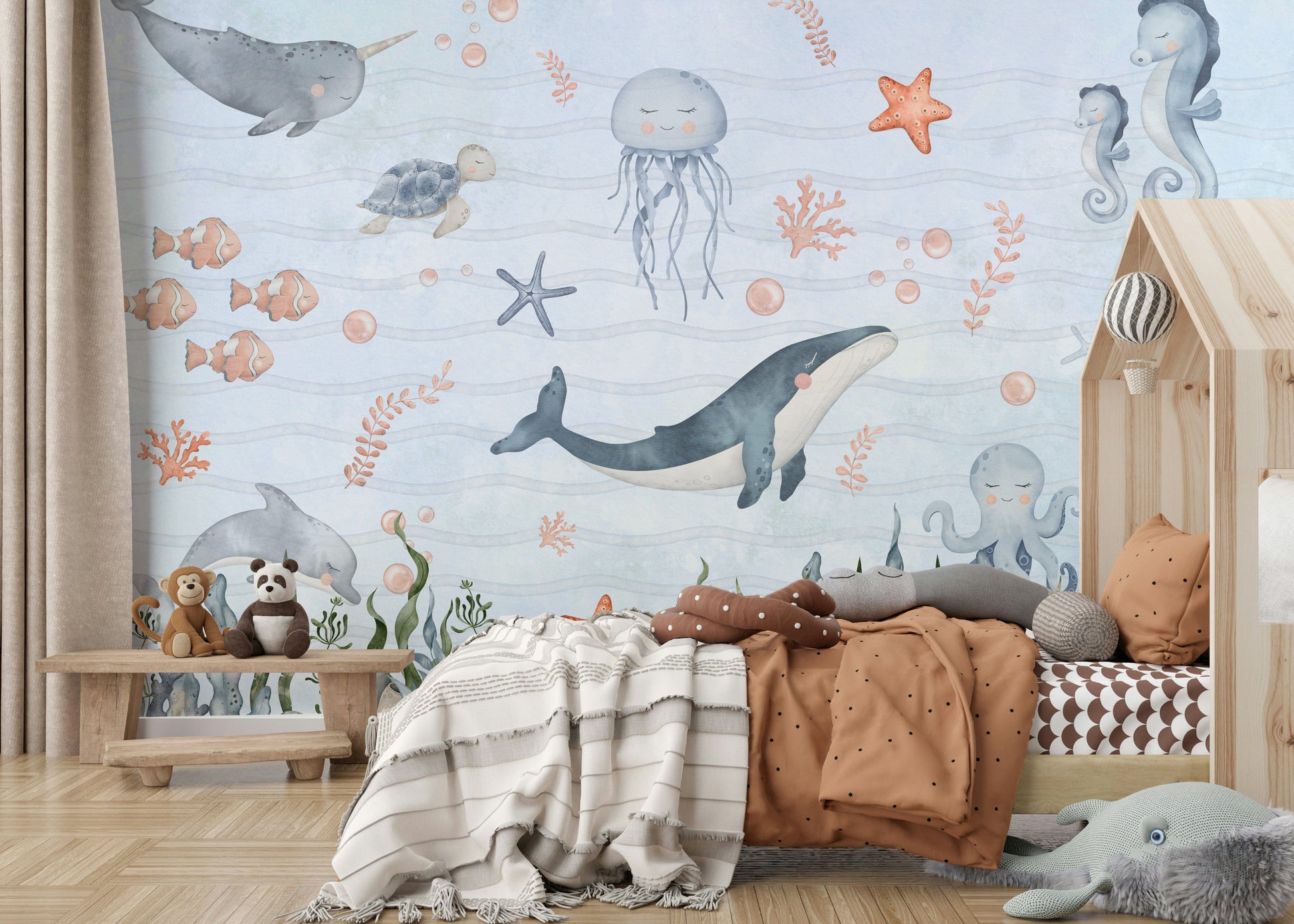 Ocean-themed wall mural for apartment nursery, pastel blue background, gentle illustrations