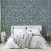 Moody blue wallpaper featuring sea kale illustrations

