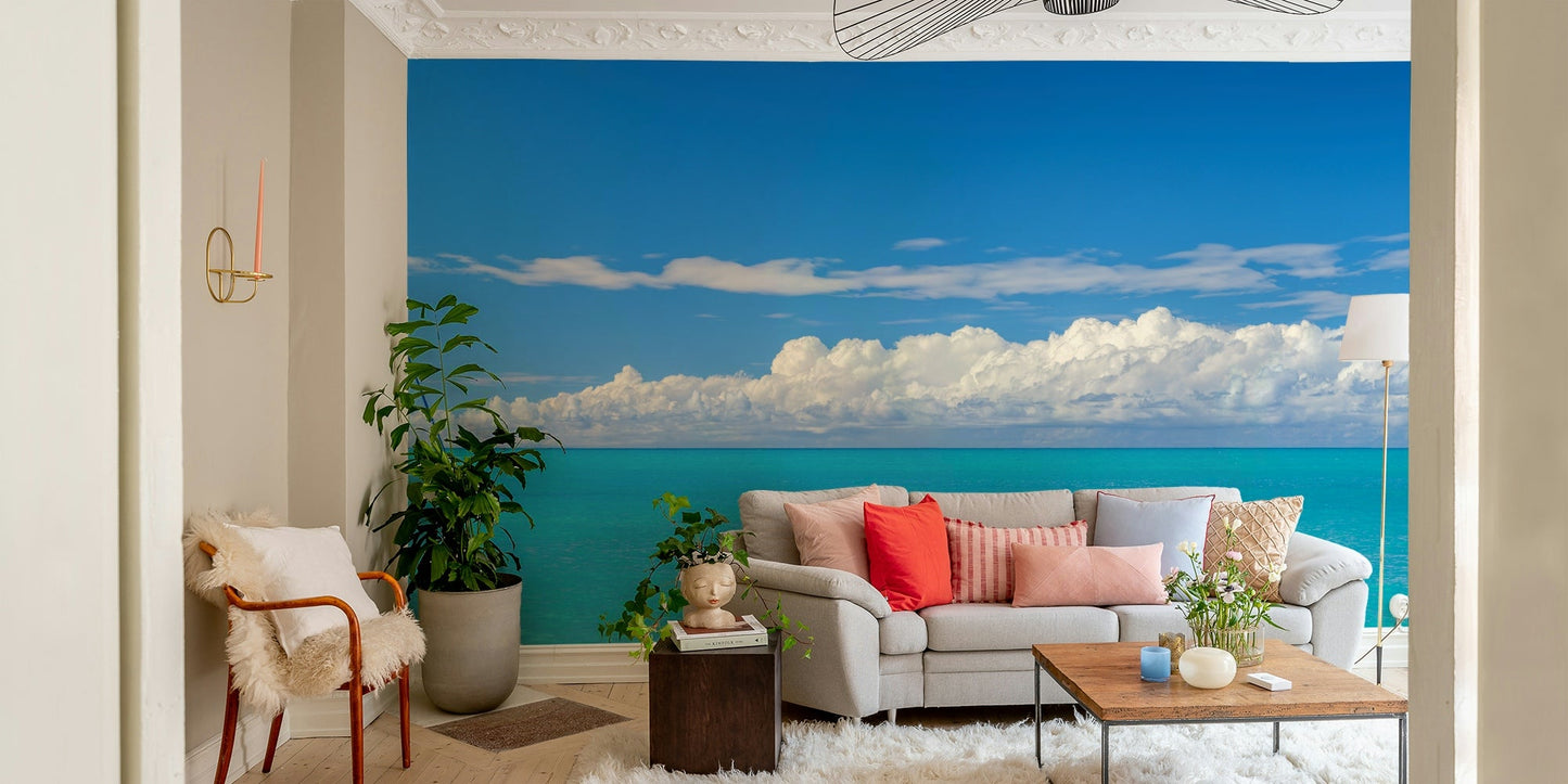 Wallpaper mural showing wide tropical sea under blue sky.

