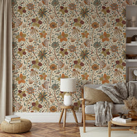 Reading nook with warm-toned garden wallpaper

