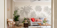 Palm Tree Wall Mural peel and stick in a living room with orange and red pillows for a vibrant tropical display.