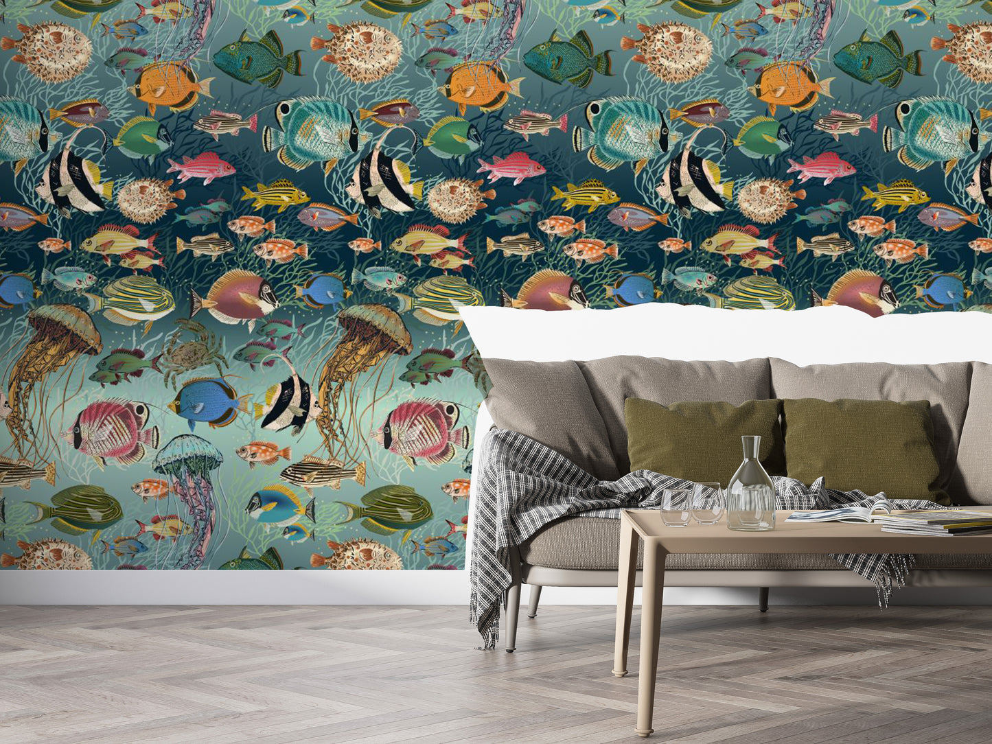 Enchanting Marine Mosaic mural of tropical fish and jellyfish on teal behind a grey sofa in a living room