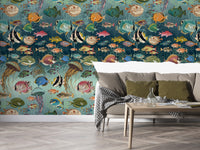 Enchanting Marine Mosaic mural of tropical fish and jellyfish on teal behind a grey sofa in a living room