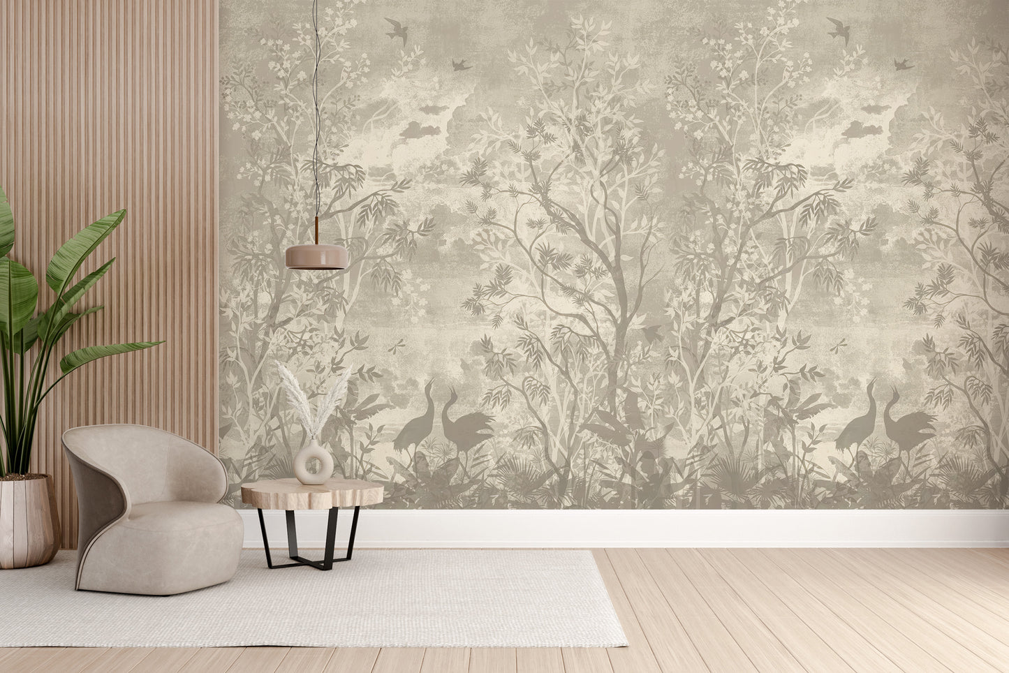 Moonlit Aves wallpaper mural with taupe trees and cranes behind a curved armchair and wood slat wall