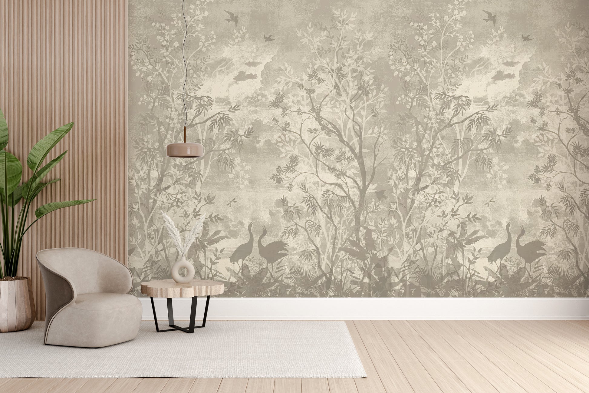 Moonlit Aves wallpaper mural with taupe trees and cranes behind a curved armchair and wood slat wall