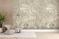 Moonlit Aves wallpaper mural with taupe trees and cranes behind a curved armchair and wood slat wall