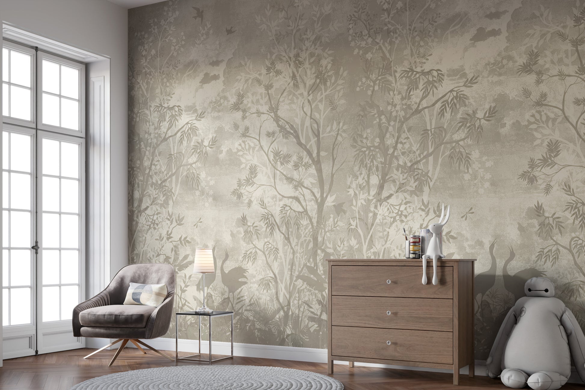 Moonlit Aves wallpaper mural in soft beige behind a grey armchair and wood dresser in a nursery