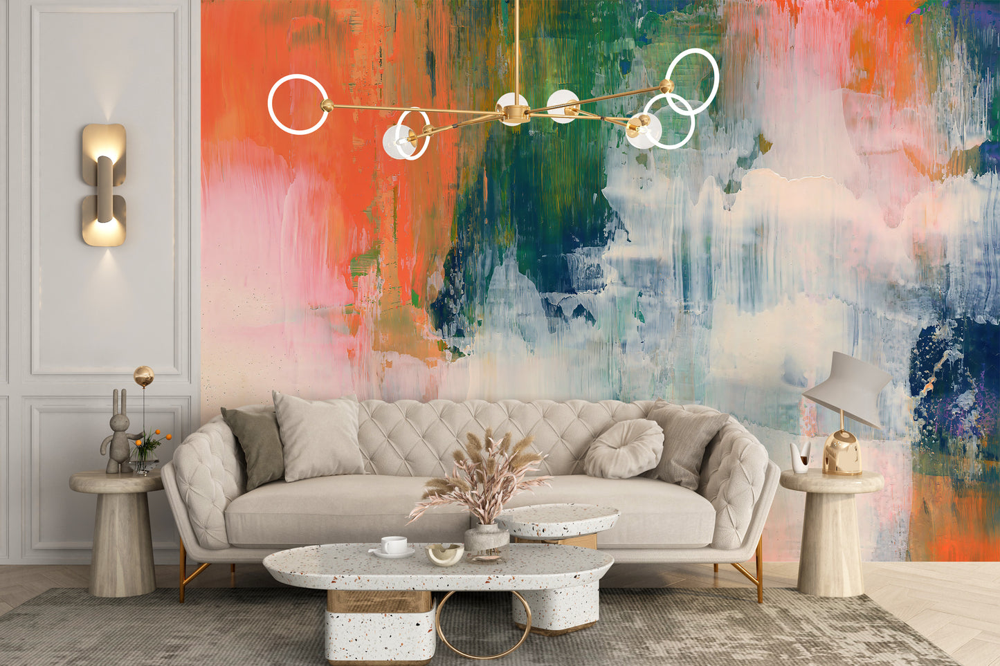 Abstract Brushstroke wallpaper mural of vibrant brushstrokes behind a cream tufted sofa and terrazzo coffee table