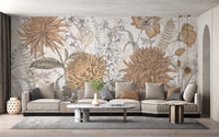 Rustic Botanical Artistry mural of orange vintage flowers behind a large grey sectional sofa in a living room