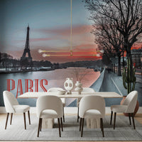Seine and Eiffel Tower Silhouette wallpaper mural with red PARIS text above a dining table and white chairs