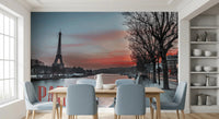 Seine and Eiffel Tower Silhouette wallpaper mural with PARIS text above a dining table and blue chairs