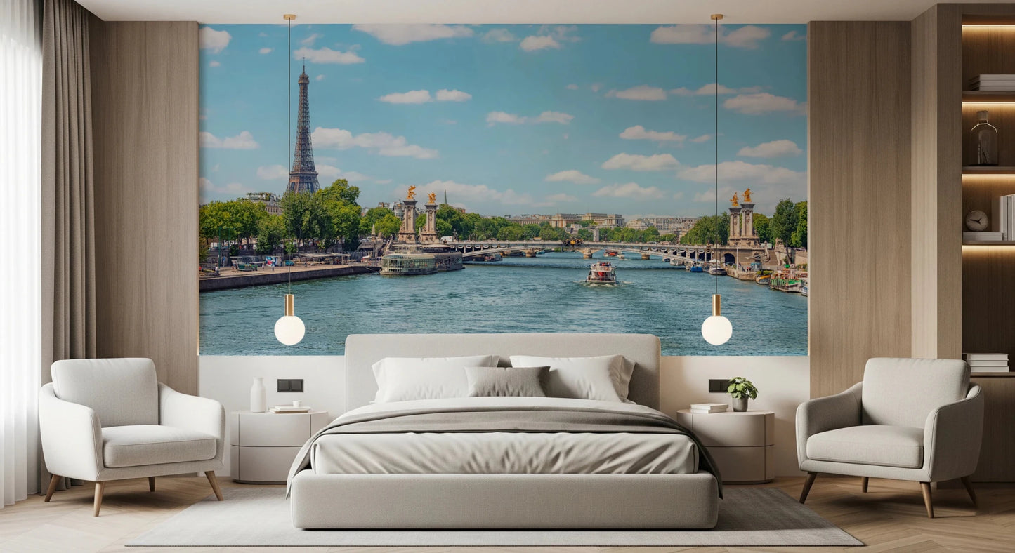 Seine Reflections wallpaper mural with Eiffel Tower and river above a grey bed with globe lamps and armchairs in a bedroom