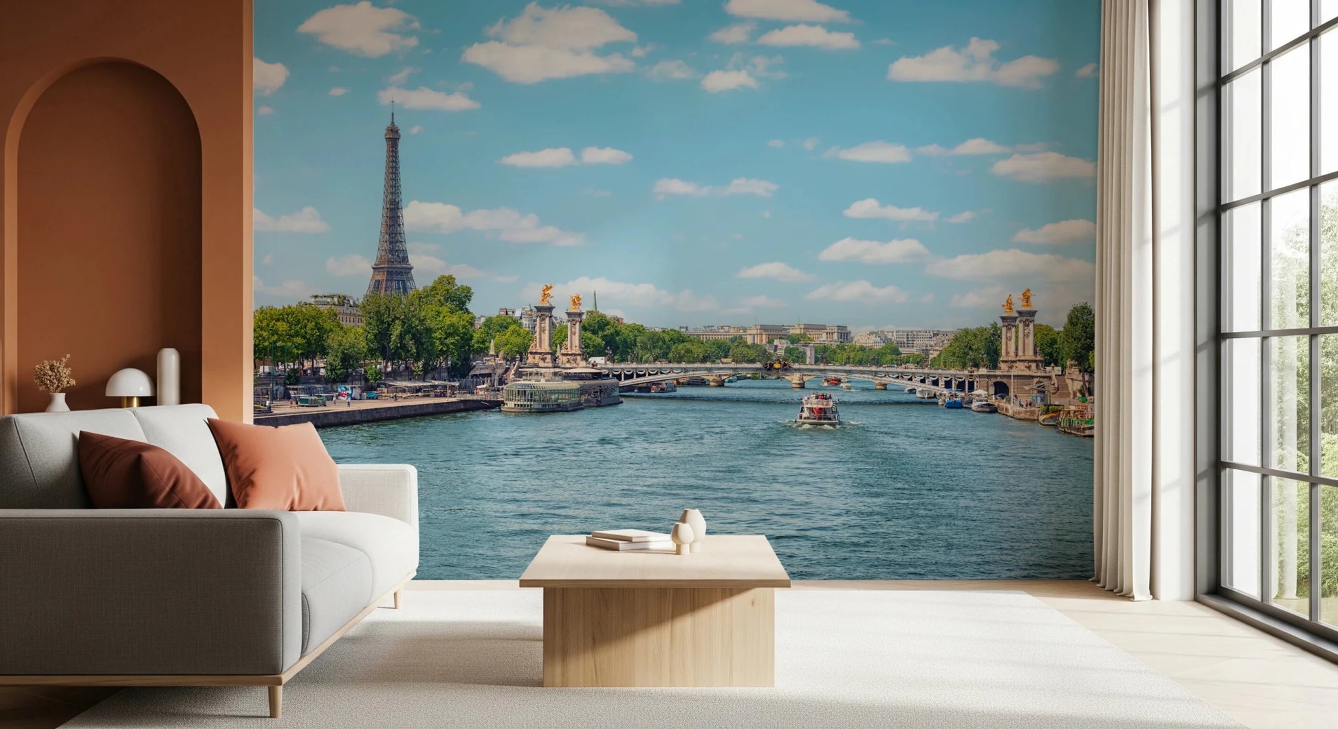 Seine Reflections wallpaper mural with Paris skyline by a white sofa and terracotta arch wall in a living room