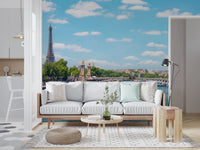 Seine Reflections wallpaper mural of the Eiffel Tower and Seine above a white sofa with pastel cushions in a living room