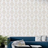 An artistic lush foliage mural on minimalist wallpaper.

